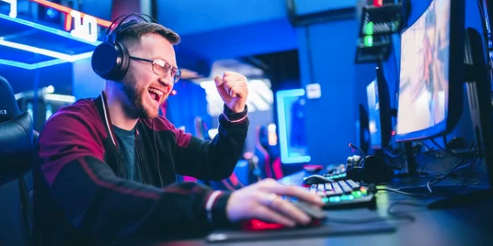 Man at elaborate computer gaming system