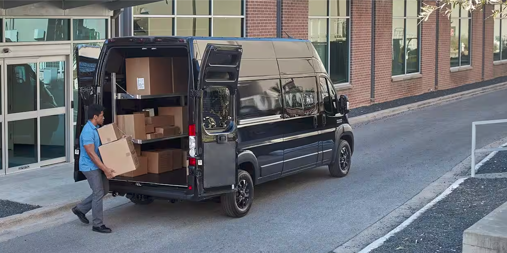Man loading boxes into cargo van