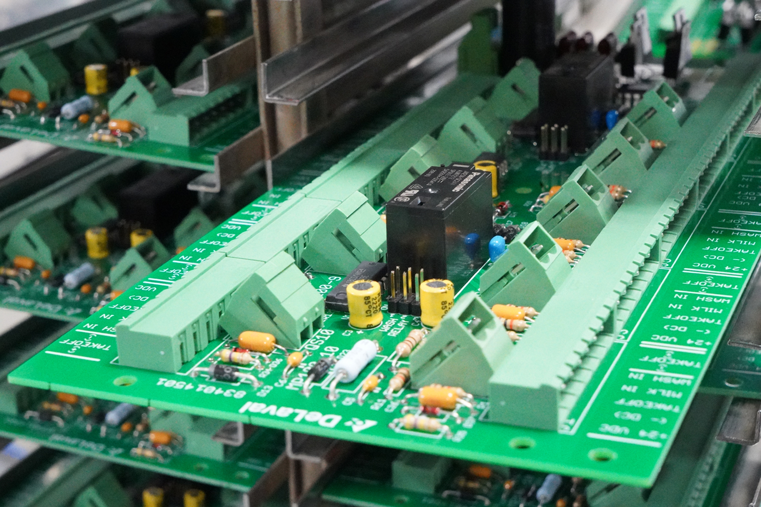 Photo of PCB board in rack