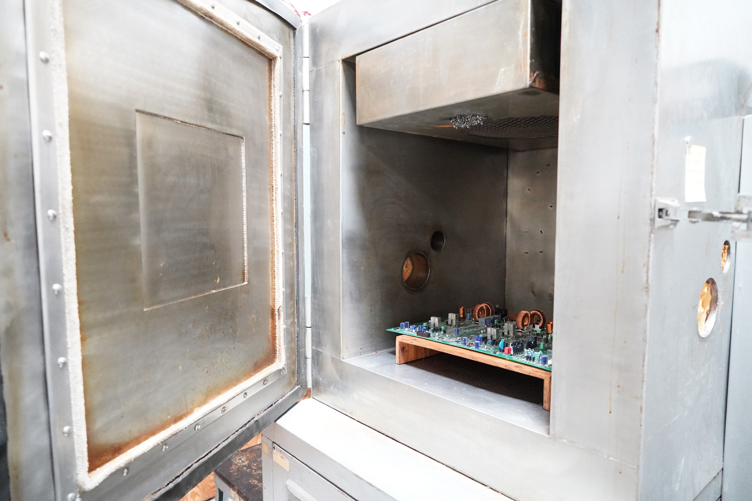 Image of commercial oven used to test for operation in hot environments